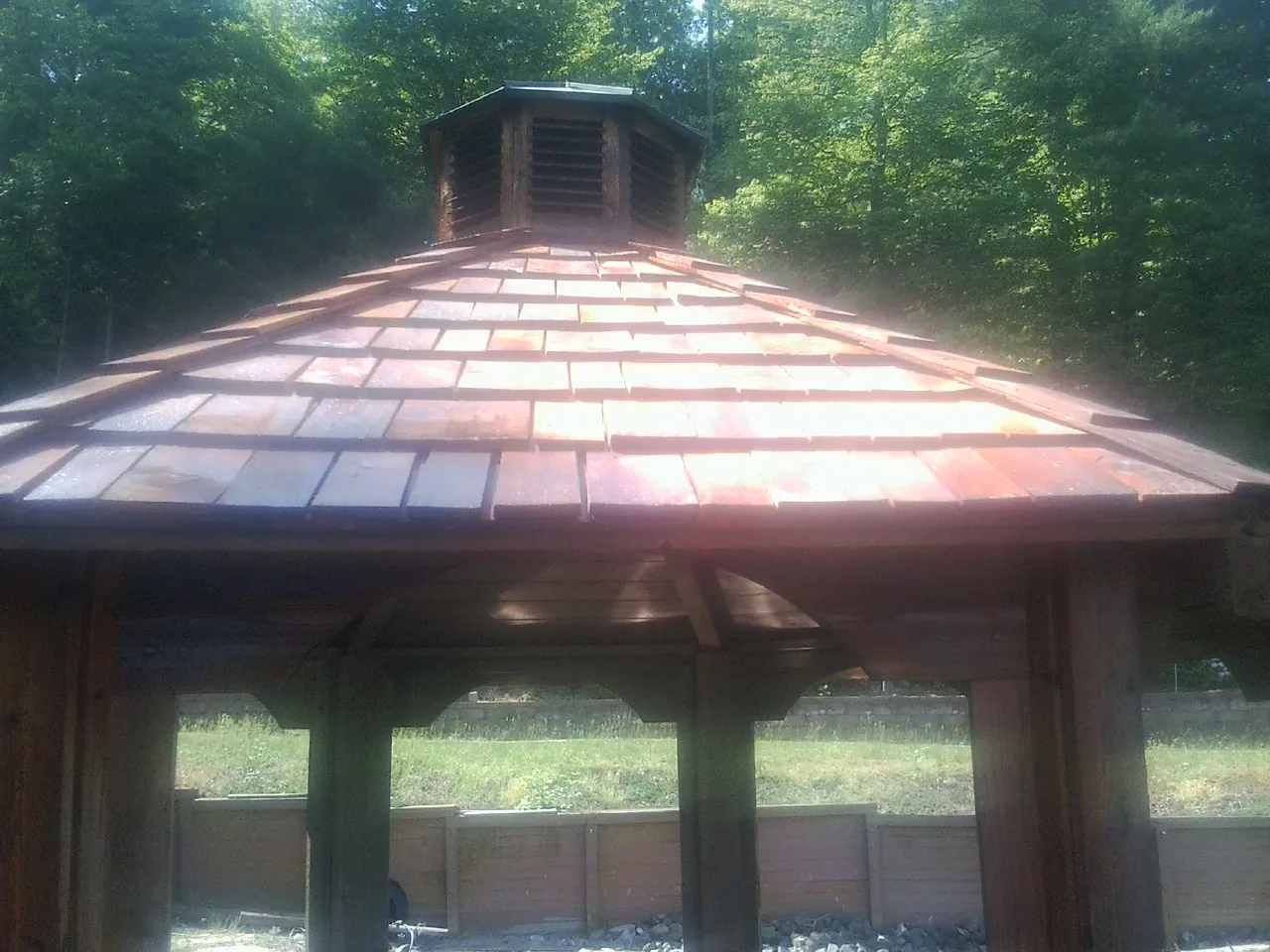 New cedar shake roof and cupola on a lakeside gazebo in Belleair Beach